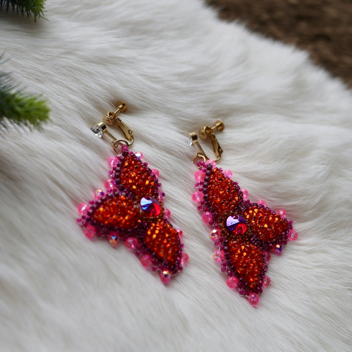 Mercedes G. Petite Bright Orange Raised Half Floral Clip-on Earrings