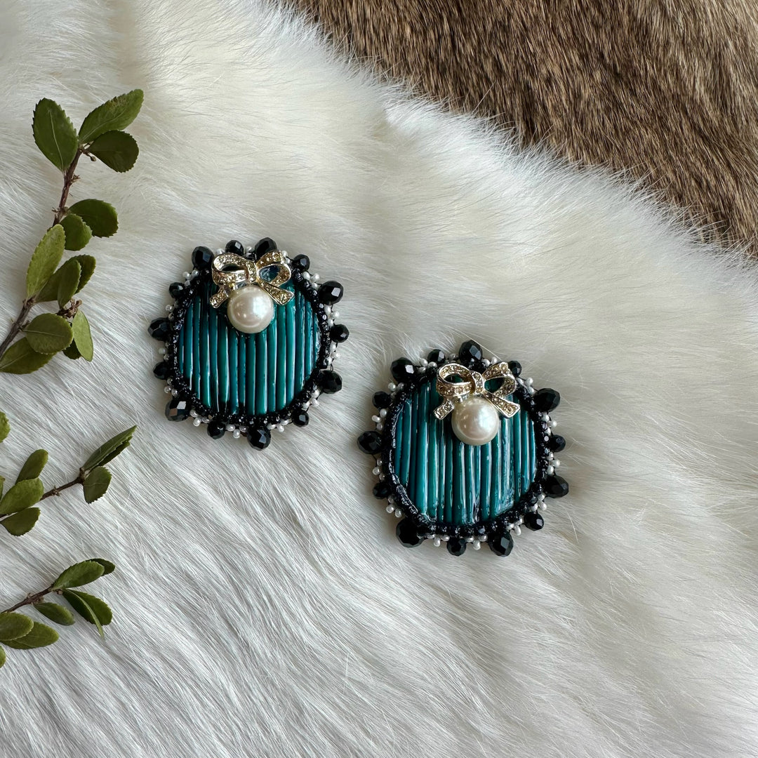 Mercedes G. Teal Quill Earrings