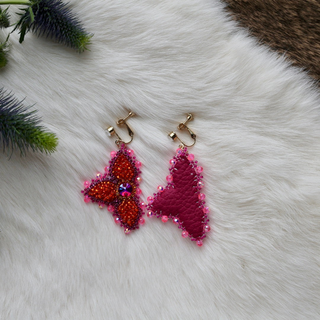 Mercedes G. Petite Bright Orange Raised Half Floral Clip-on Earrings