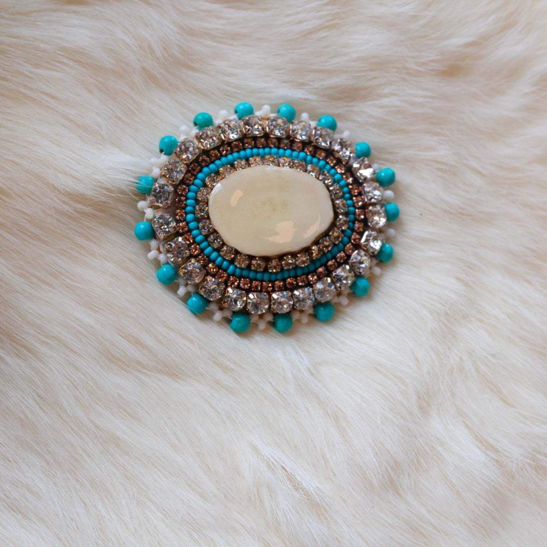 Mercedes G. Teal Antler Pin