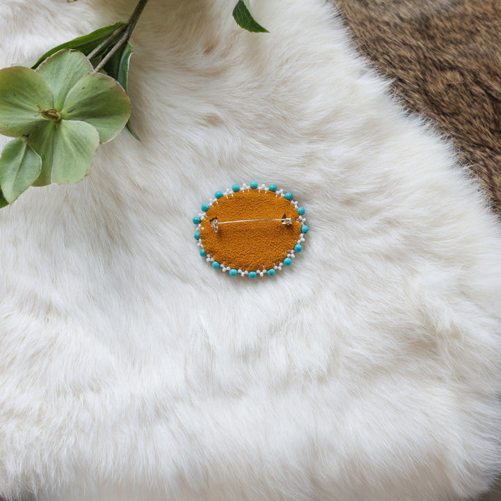 Mercedes G. Teal Antler Pin