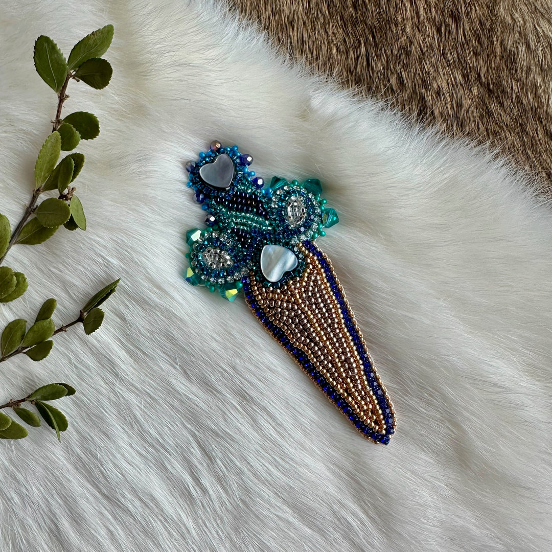 Mercedes G. Beaded Sword Pin
