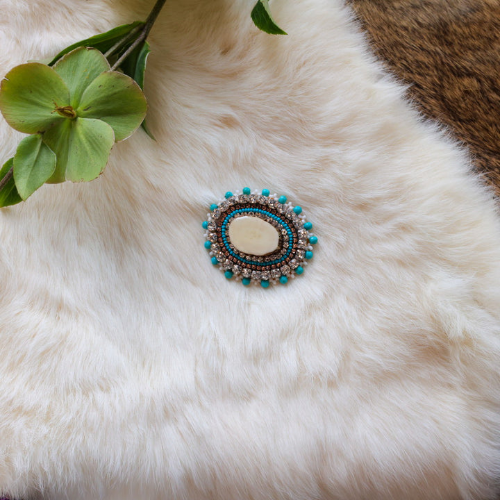 Mercedes G. Teal Antler Pin