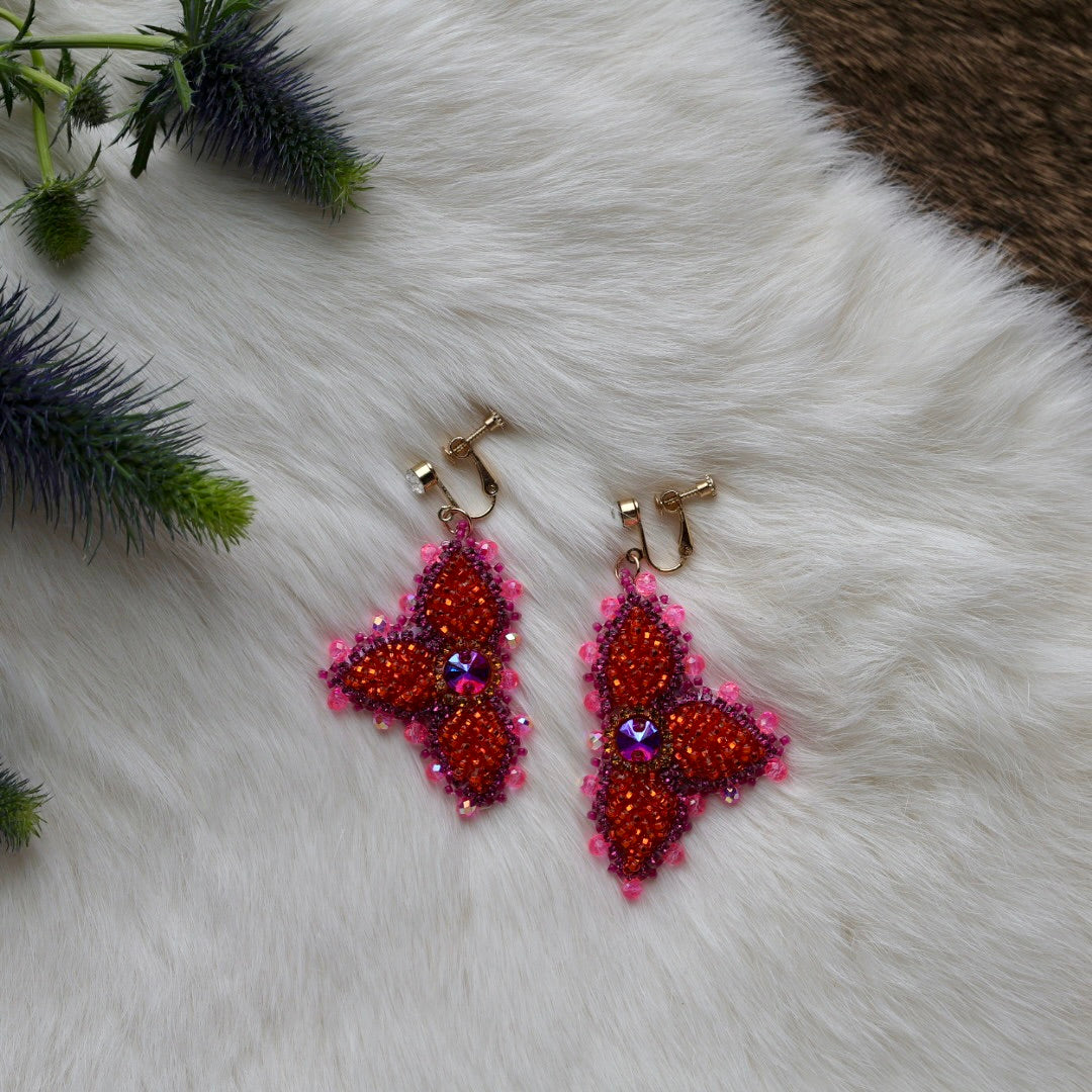 Mercedes G. Petite Bright Orange Raised Half Floral Clip-on Earrings