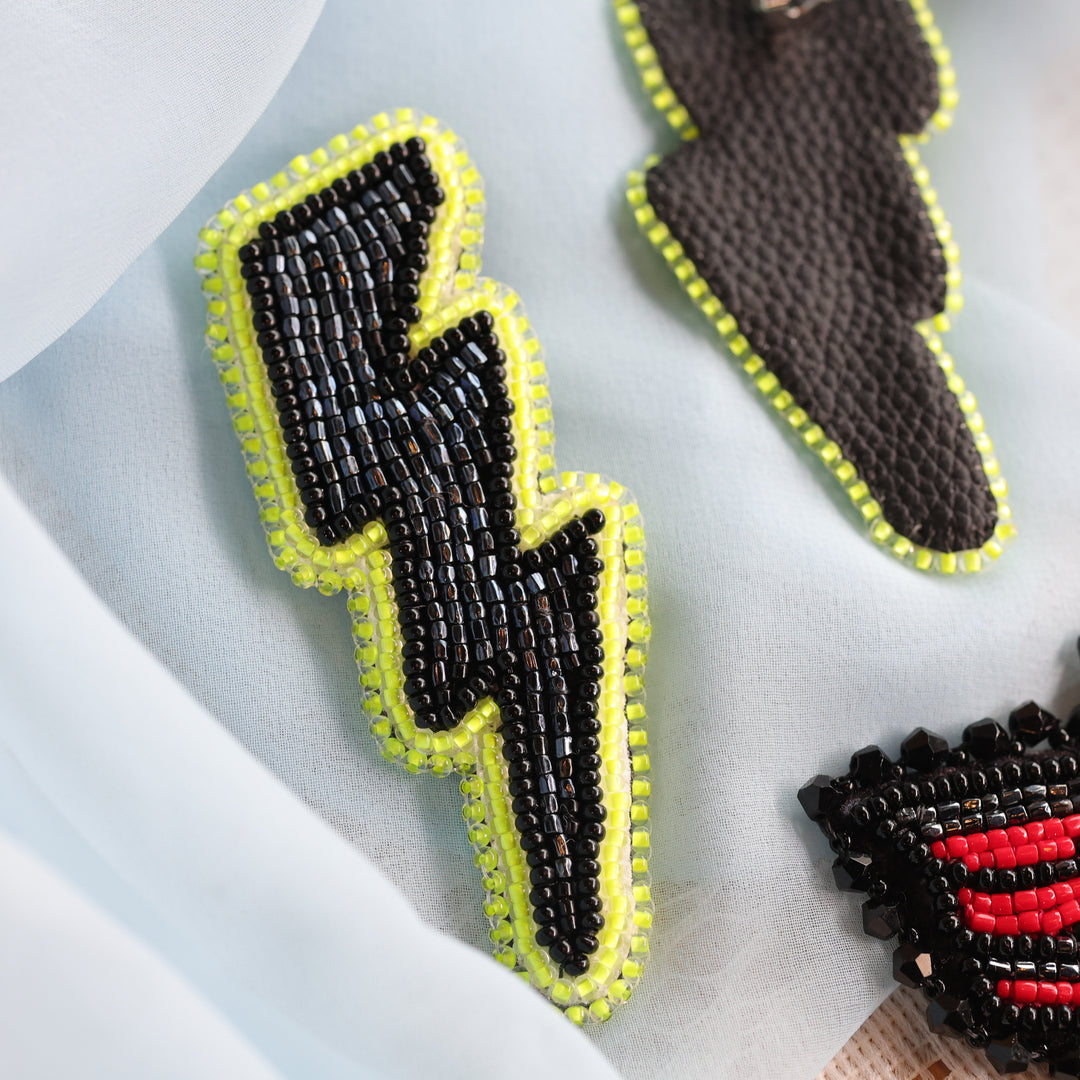 April Beadmaster Rochelle L. Thunderbird Charm & Lightning Earrings