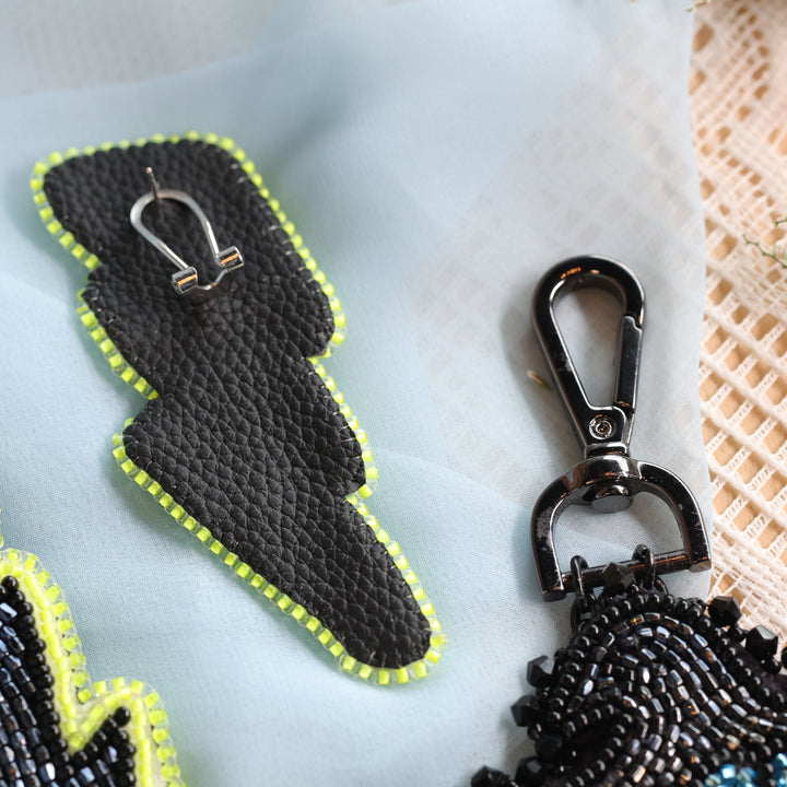 April Beadmaster Rochelle L. Thunderbird Charm & Lightning Earrings