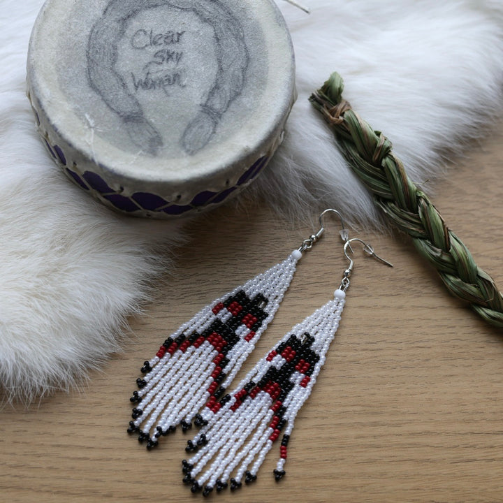 Clear Sky Woman Thunderbird Fringe Earrings