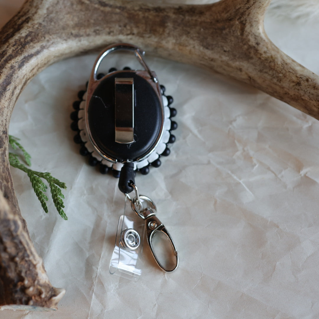 Keegan W. Druzy Cab Beaded Badge Reels