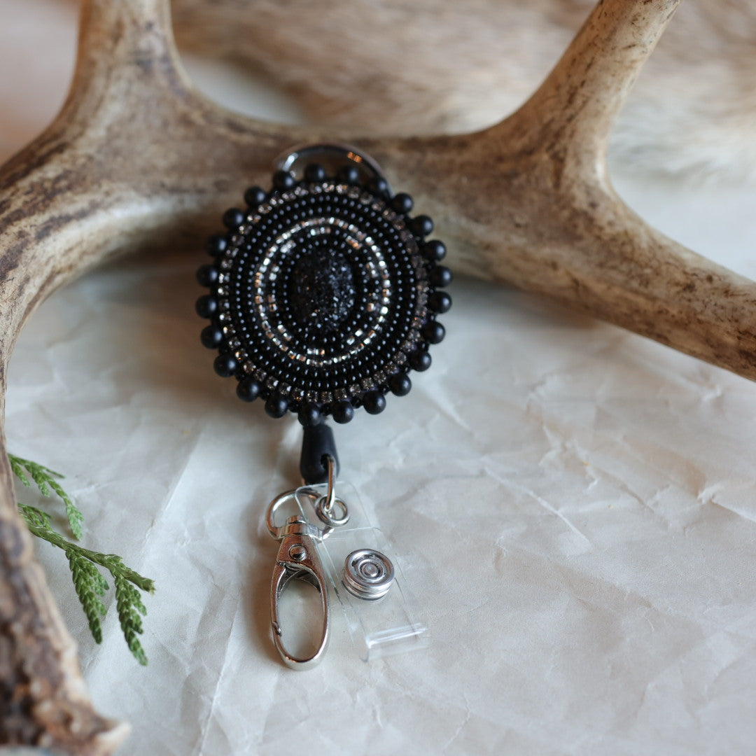 Keegan W. Druzy Cab Beaded Badge Reels