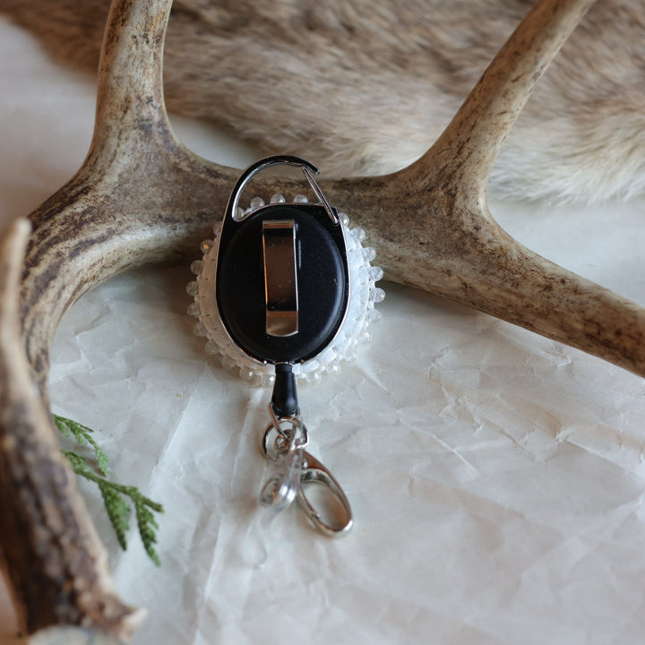 Keegan W. Druzy Cab Beaded Badge Reels