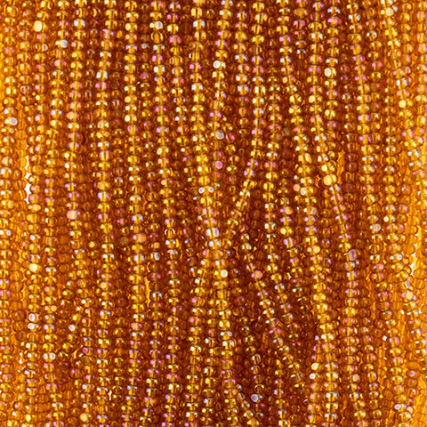 Czech Seed Bead 11/0 Charlotte Cut Transparent Topaz
