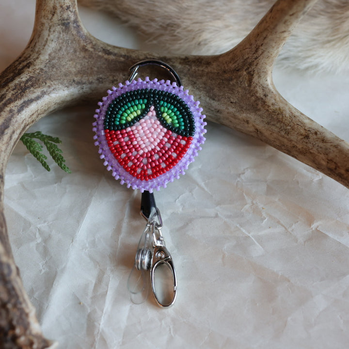 Keegan W. Strawberry Beaded Badge Reels