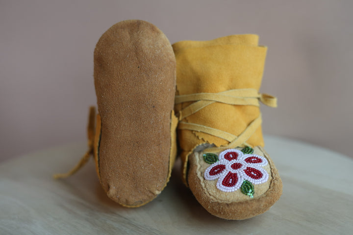 Emily J. Infant Moose Hide Wraparounds