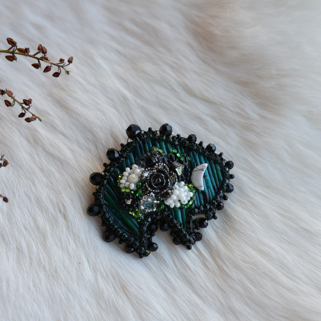 Mercedes G. Teal Quill & Floral Beaded Bison Brooch