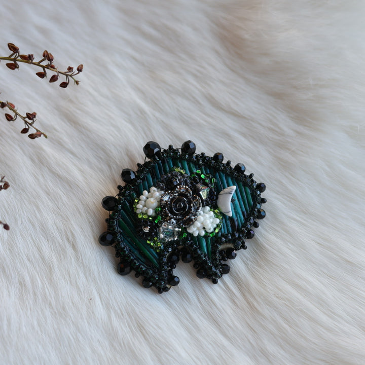 Mercedes G. Teal Quill & Floral Beaded Bison Brooch