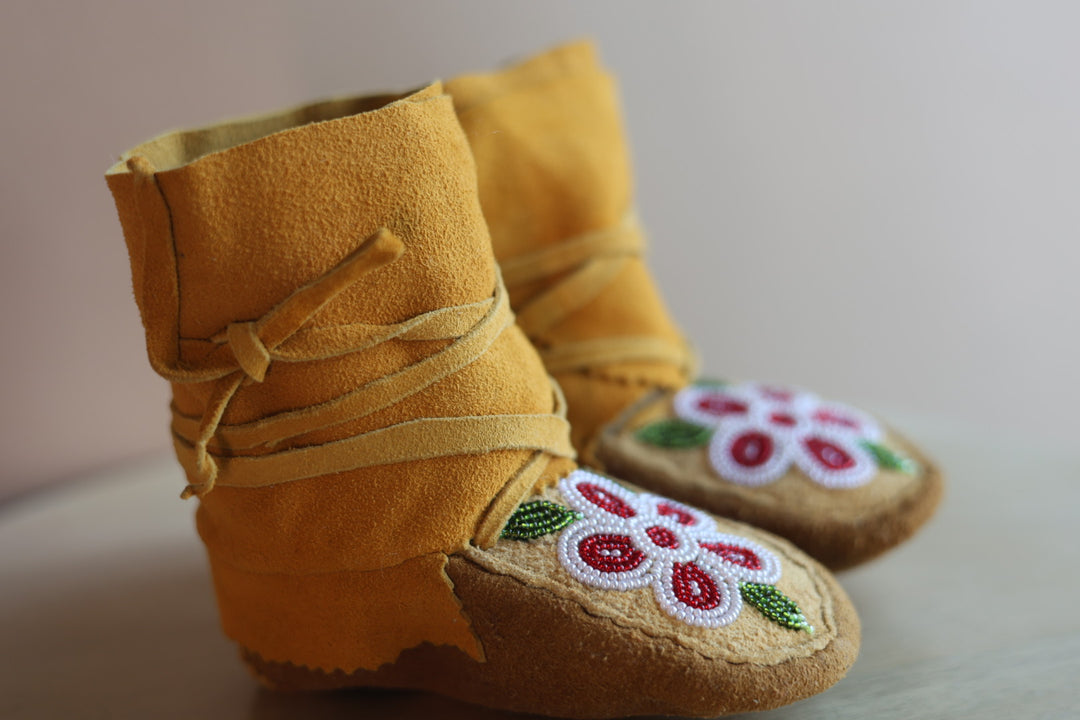 Emily J. Infant Moose Hide Wraparounds