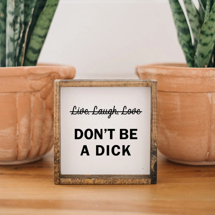 "Don't Be a Dick" Wood Sign by william rae